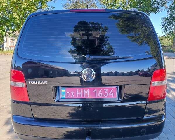 Чорний Фольксваген Туран, об'ємом двигуна 1.6 л та пробігом 190 тис. км за 5500 $, фото 2 на Automoto.ua