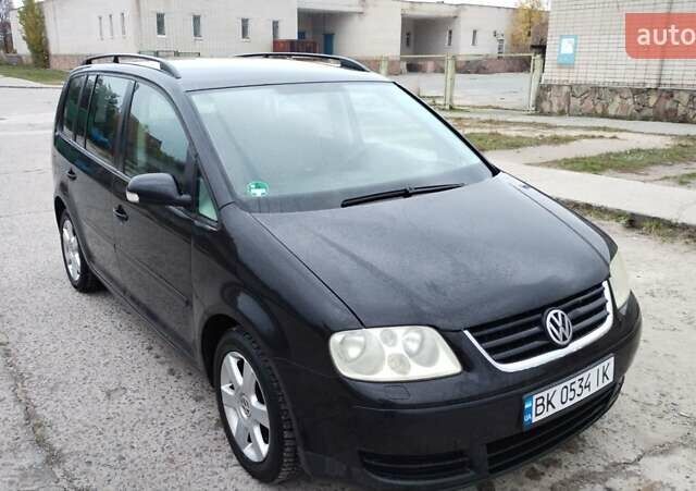 Чорний Фольксваген Туран, об'ємом двигуна 1.6 л та пробігом 249 тис. км за 5500 $, фото 10 на Automoto.ua