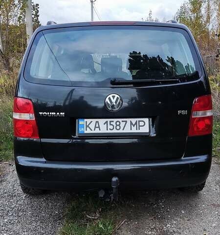 Черный Фольксваген Туран, объемом двигателя 1.6 л и пробегом 225 тыс. км за 5700 $, фото 10 на Automoto.ua