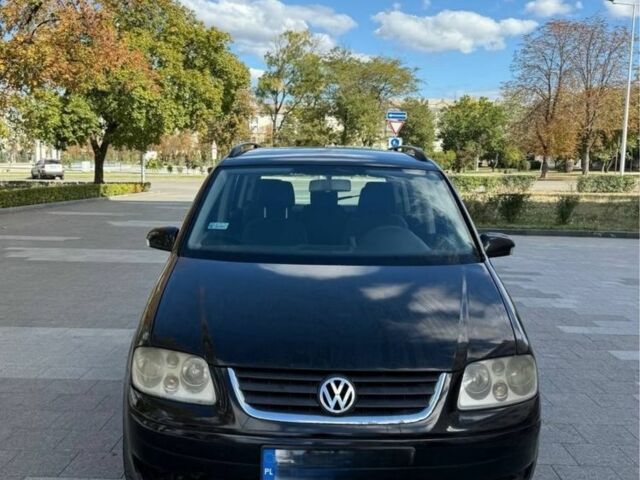 Черный Фольксваген Туран, объемом двигателя 0 л и пробегом 300 тыс. км за 3021 $, фото 3 на Automoto.ua