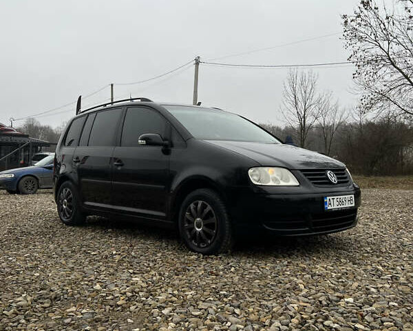 Черный Фольксваген Туран, объемом двигателя 1.6 л и пробегом 208 тыс. км за 5700 $, фото 21 на Automoto.ua