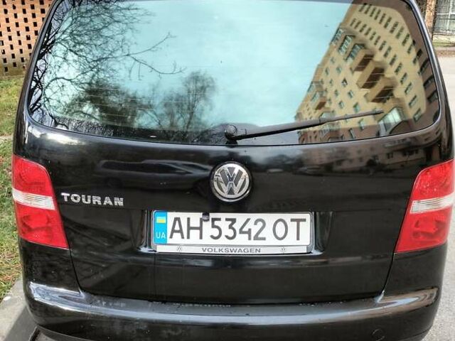 Черный Фольксваген Туран, объемом двигателя 1.6 л и пробегом 202 тыс. км за 5300 $, фото 6 на Automoto.ua