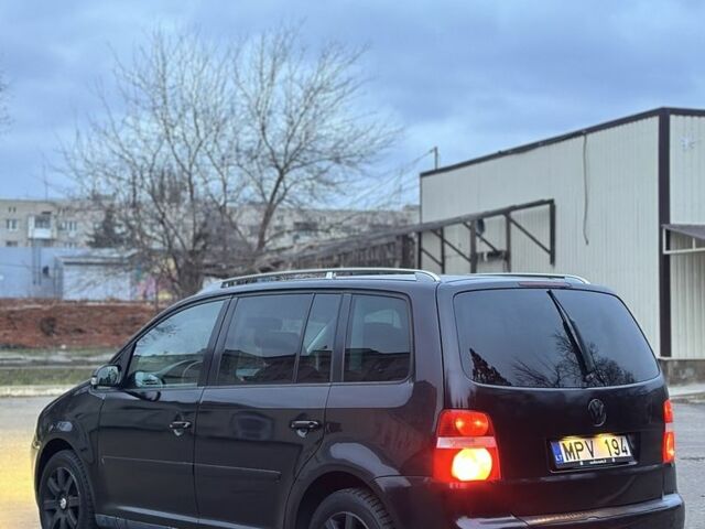 Черный Фольксваген Туран, объемом двигателя 2 л и пробегом 420 тыс. км за 3400 $, фото 5 на Automoto.ua