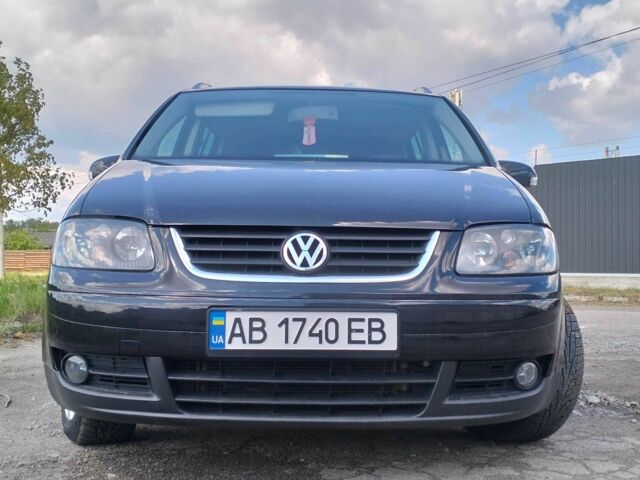 Черный Фольксваген Туран, объемом двигателя 2 л и пробегом 260 тыс. км за 6500 $, фото 1 на Automoto.ua