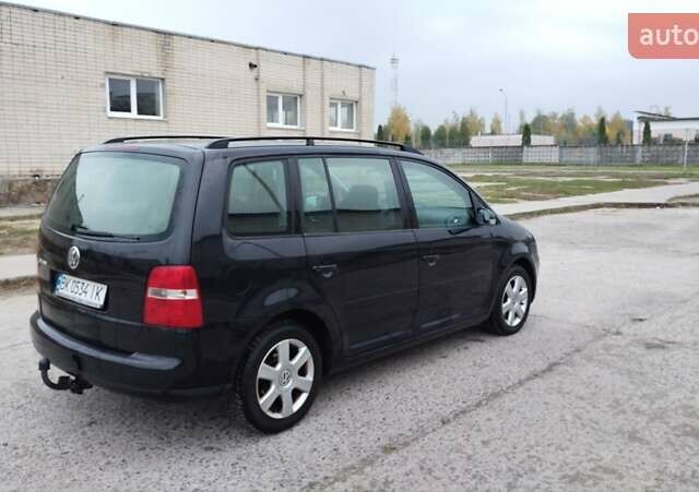 Чорний Фольксваген Туран, об'ємом двигуна 1.6 л та пробігом 249 тис. км за 5500 $, фото 7 на Automoto.ua