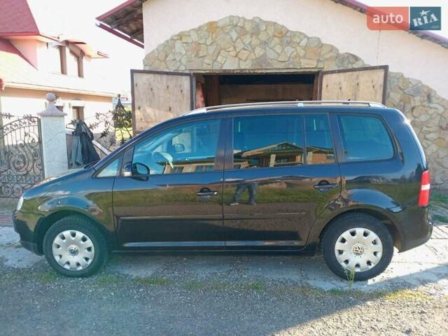 Черный Фольксваген Туран, объемом двигателя 1.6 л и пробегом 309 тыс. км за 5900 $, фото 12 на Automoto.ua