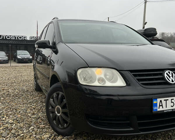 Черный Фольксваген Туран, объемом двигателя 1.6 л и пробегом 208 тыс. км за 5700 $, фото 8 на Automoto.ua