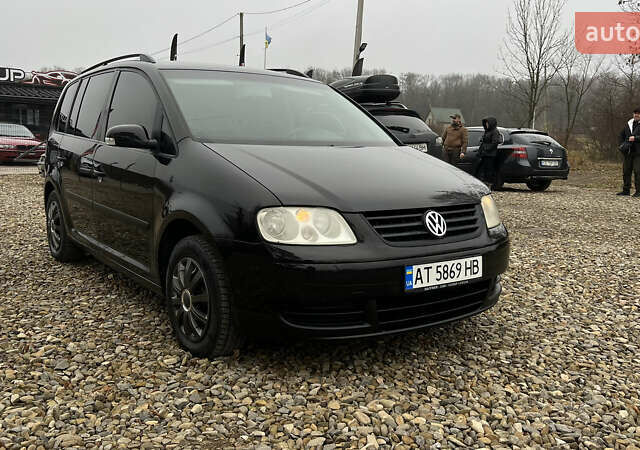 Черный Фольксваген Туран, объемом двигателя 1.6 л и пробегом 208 тыс. км за 5700 $, фото 34 на Automoto.ua