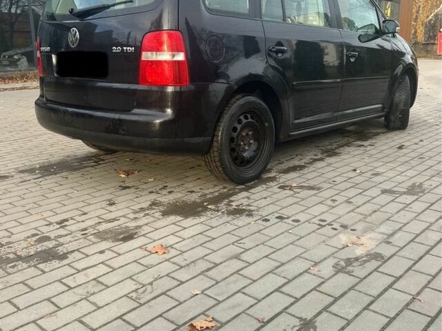 Чорний Фольксваген Туран, об'ємом двигуна 2 л та пробігом 300 тис. км за 2500 $, фото 1 на Automoto.ua