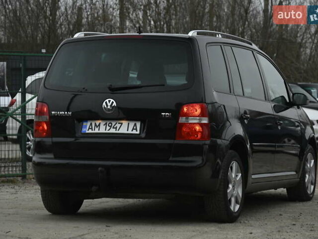 Чорний Фольксваген Туран, об'ємом двигуна 2 л та пробігом 267 тис. км за 5999 $, фото 10 на Automoto.ua