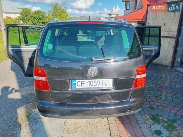 Черный Фольксваген Туран, объемом двигателя 1.6 л и пробегом 309 тыс. км за 5900 $, фото 3 на Automoto.ua