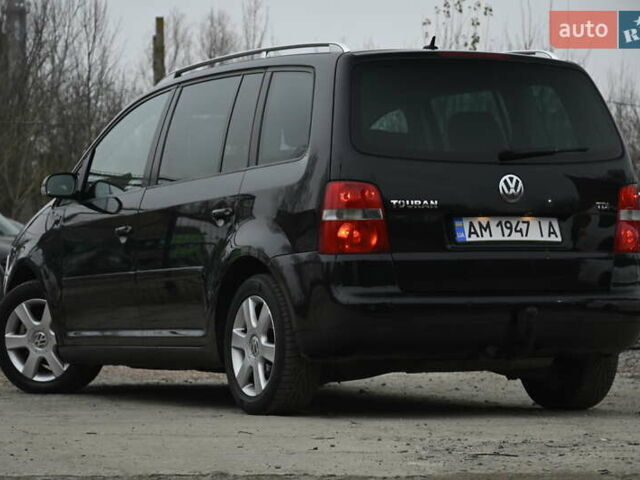 Чорний Фольксваген Туран, об'ємом двигуна 2 л та пробігом 267 тис. км за 5999 $, фото 7 на Automoto.ua