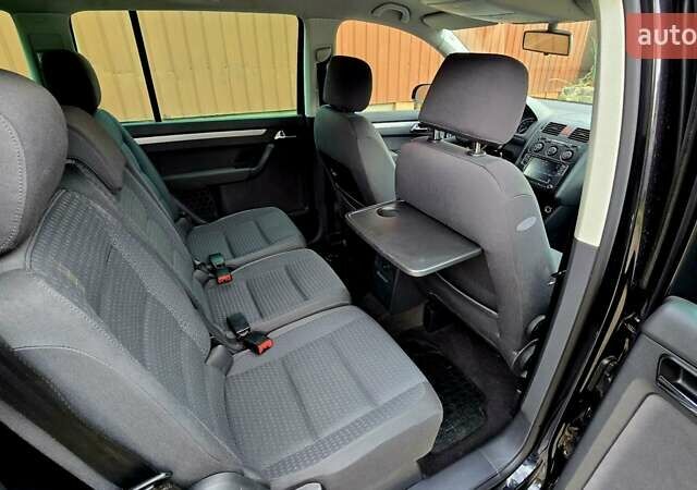 Черный Фольксваген Туран, объемом двигателя 1.6 л и пробегом 239 тыс. км за 6777 $, фото 57 на Automoto.ua