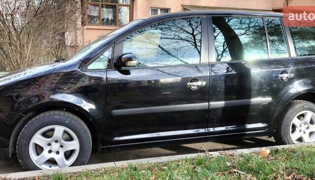 Черный Фольксваген Туран, объемом двигателя 1.6 л и пробегом 202 тыс. км за 5300 $, фото 7 на Automoto.ua