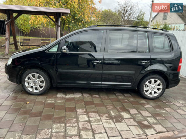 Черный Фольксваген Туран, объемом двигателя 1.6 л и пробегом 271 тыс. км за 5500 $, фото 5 на Automoto.ua