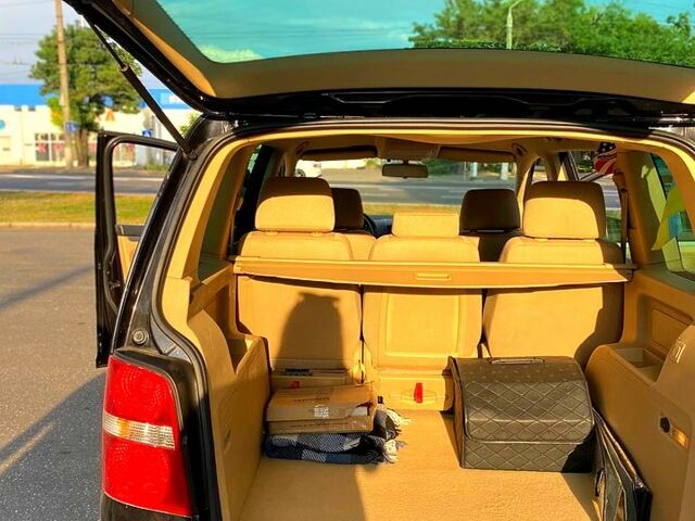 Черный Фольксваген Туран, объемом двигателя 2 л и пробегом 265 тыс. км за 5800 $, фото 7 на Automoto.ua