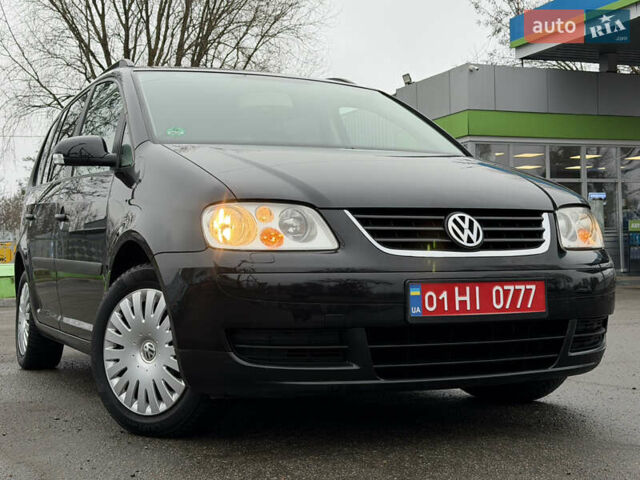 Черный Фольксваген Туран, объемом двигателя 1.6 л и пробегом 214 тыс. км за 5999 $, фото 10 на Automoto.ua