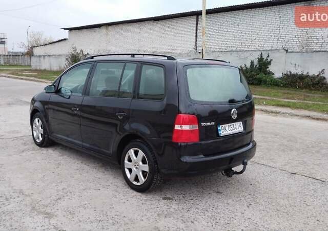 Чорний Фольксваген Туран, об'ємом двигуна 1.6 л та пробігом 249 тис. км за 5500 $, фото 6 на Automoto.ua