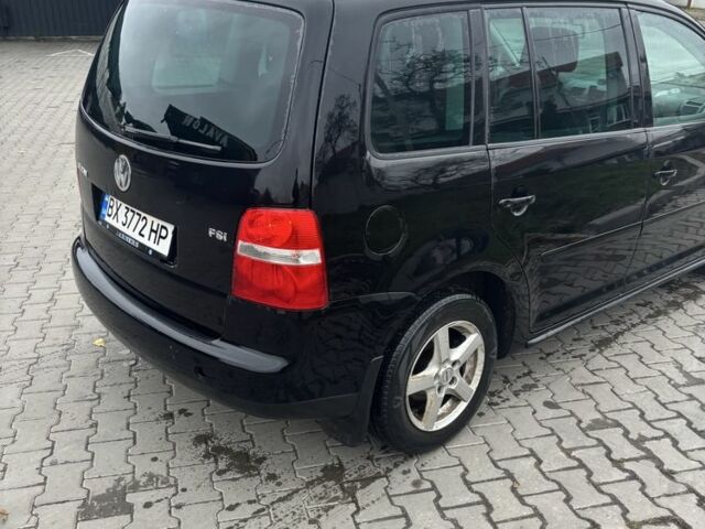 Черный Фольксваген Туран, объемом двигателя 1.6 л и пробегом 290 тыс. км за 4600 $, фото 2 на Automoto.ua