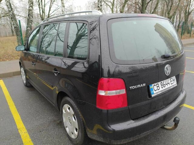 Черный Фольксваген Туран, объемом двигателя 1.6 л и пробегом 320 тыс. км за 5400 $, фото 7 на Automoto.ua