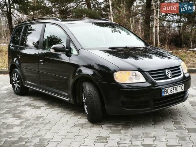 Черный Фольксваген Туран, объемом двигателя 2 л и пробегом 321 тыс. км за 5500 $, фото 3 на Automoto.ua