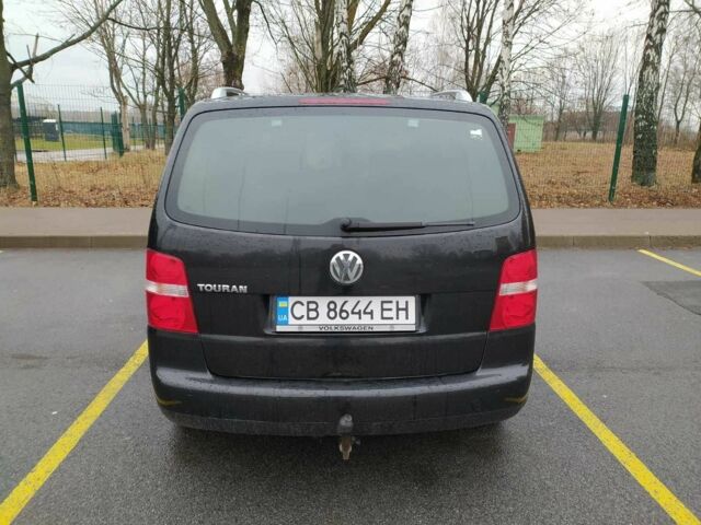 Черный Фольксваген Туран, объемом двигателя 1.6 л и пробегом 320 тыс. км за 5400 $, фото 3 на Automoto.ua