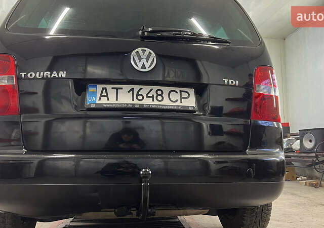 Черный Фольксваген Туран, объемом двигателя 1.9 л и пробегом 419 тыс. км за 5900 $, фото 11 на Automoto.ua