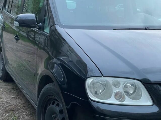 Фольксваген Туран 2005 в Николаеве на Automoto.ua Черный Фольксваген Туран, объемом двигателя 2 л и пробегом 280 тыс. км за 6400 $, фото 4 на Automoto.ua