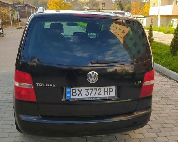 Черный Фольксваген Туран, объемом двигателя 1.6 л и пробегом 283 тыс. км за 5200 $, фото 19 на Automoto.ua