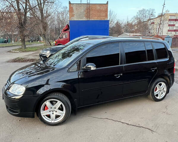 Черный Фольксваген Туран, объемом двигателя 1.6 л и пробегом 229 тыс. км за 6450 $, фото 15 на Automoto.ua