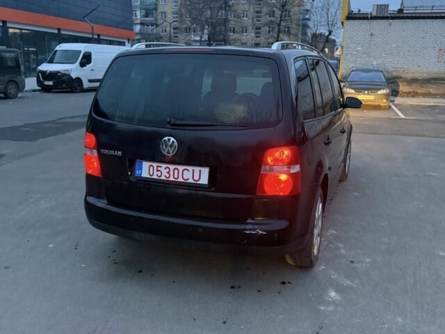 Черный Фольксваген Туран, объемом двигателя 2 л и пробегом 377 тыс. км за 2500 $, фото 2 на Automoto.ua
