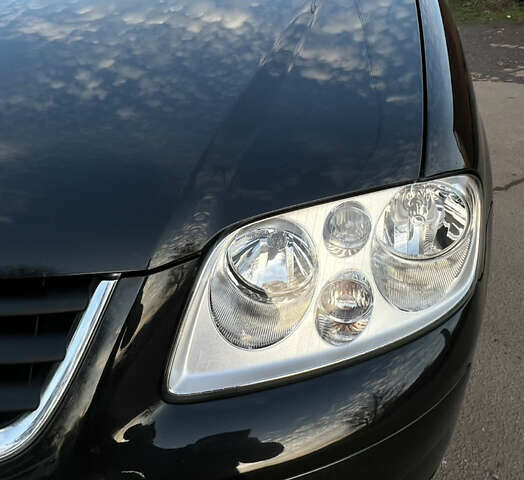 Черный Фольксваген Туран, объемом двигателя 1.6 л и пробегом 229 тыс. км за 6450 $, фото 21 на Automoto.ua