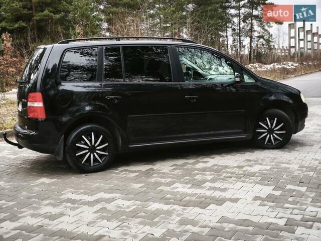 Черный Фольксваген Туран, объемом двигателя 2 л и пробегом 321 тыс. км за 5500 $, фото 4 на Automoto.ua