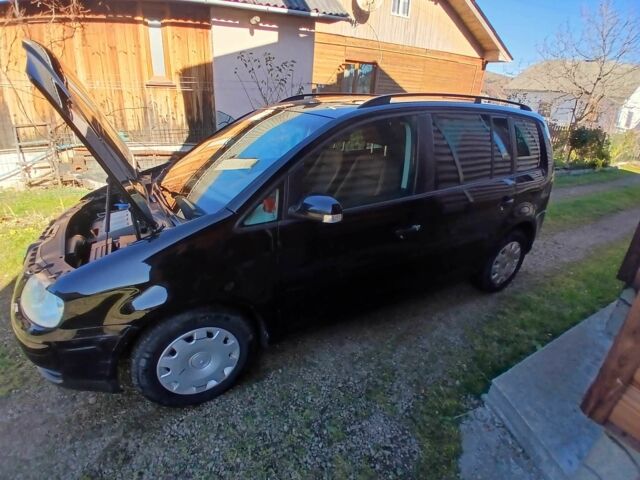 Черный Фольксваген Туран, объемом двигателя 1.9 л и пробегом 419 тыс. км за 4700 $, фото 1 на Automoto.ua