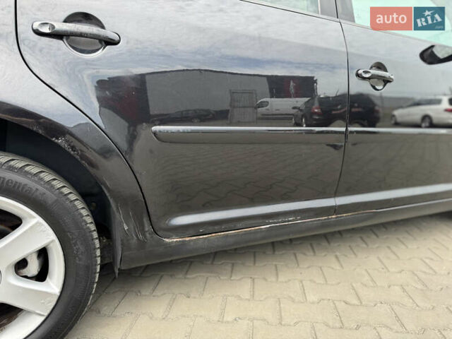 Черный Фольксваген Туран, объемом двигателя 1.98 л и пробегом 188 тыс. км за 4600 $, фото 17 на Automoto.ua