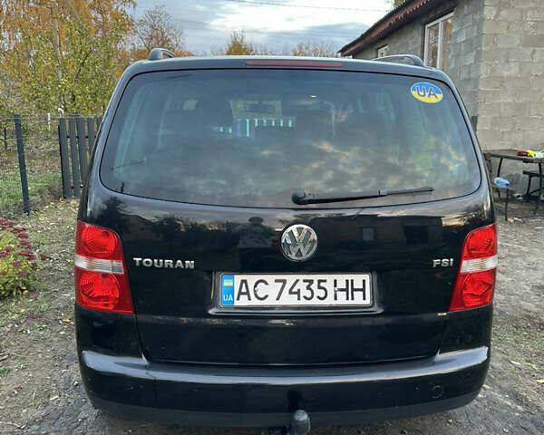Чорний Фольксваген Туран, об'ємом двигуна 1.6 л та пробігом 295 тис. км за 5700 $, фото 2 на Automoto.ua