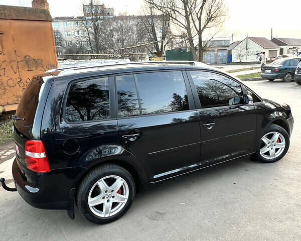 Черный Фольксваген Туран, объемом двигателя 1.6 л и пробегом 229 тыс. км за 6450 $, фото 8 на Automoto.ua