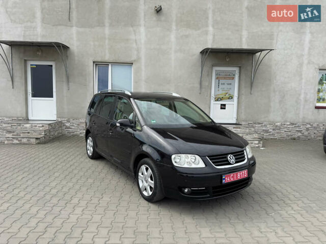 Черный Фольксваген Туран, объемом двигателя 1.98 л и пробегом 188 тыс. км за 4600 $, фото 1 на Automoto.ua