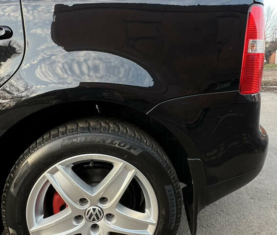 Черный Фольксваген Туран, объемом двигателя 1.6 л и пробегом 229 тыс. км за 6450 $, фото 19 на Automoto.ua