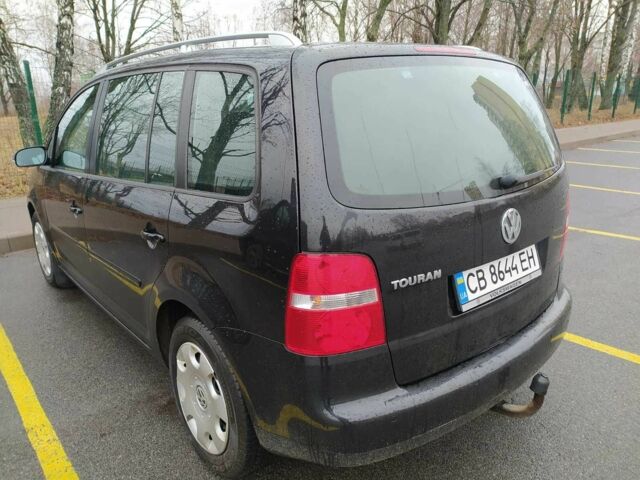 Черный Фольксваген Туран, объемом двигателя 1.6 л и пробегом 320 тыс. км за 5400 $, фото 8 на Automoto.ua