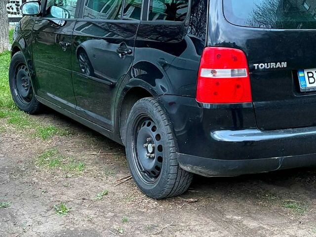 Чорний Фольксваген Туран, об'ємом двигуна 2 л та пробігом 243 тис. км за 6500 $, фото 3 на Automoto.ua