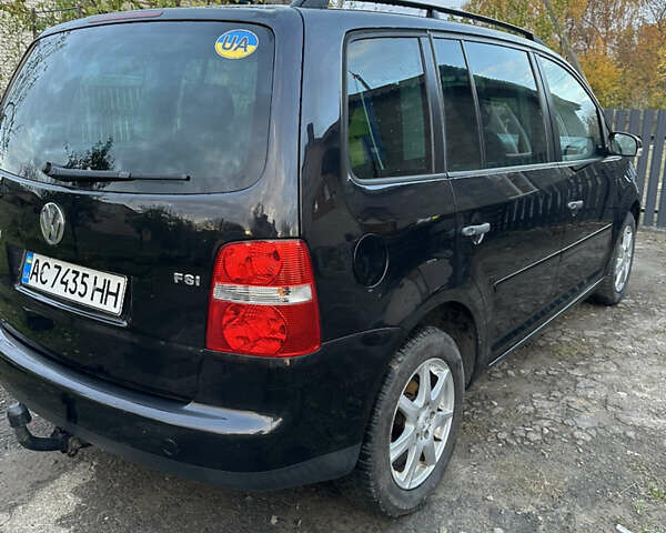 Чорний Фольксваген Туран, об'ємом двигуна 1.6 л та пробігом 295 тис. км за 5700 $, фото 4 на Automoto.ua