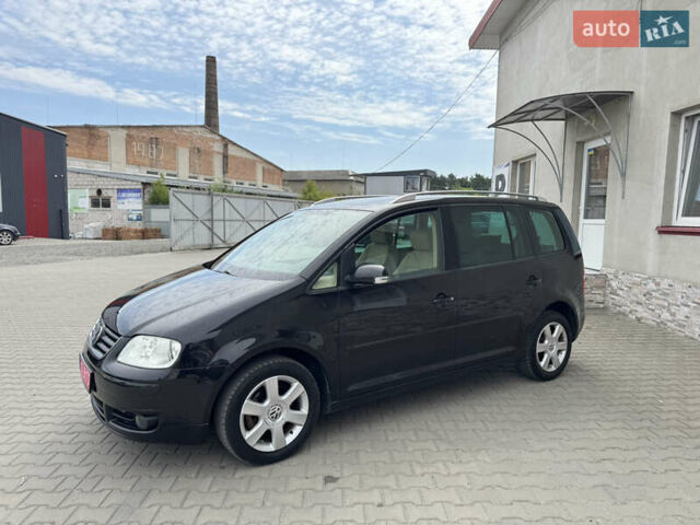 Черный Фольксваген Туран, объемом двигателя 1.98 л и пробегом 188 тыс. км за 4600 $, фото 5 на Automoto.ua