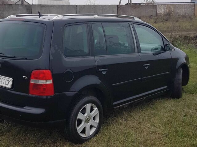 Черный Фольксваген Туран, объемом двигателя 2 л и пробегом 224 тыс. км за 4500 $, фото 5 на Automoto.ua