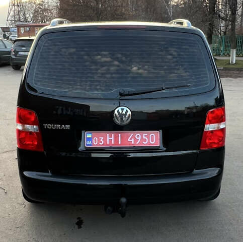 Черный Фольксваген Туран, объемом двигателя 1.6 л и пробегом 229 тыс. км за 6450 $, фото 11 на Automoto.ua