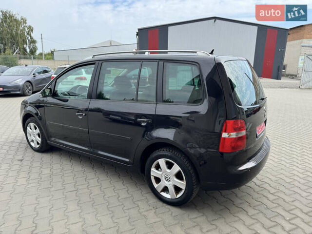 Черный Фольксваген Туран, объемом двигателя 1.98 л и пробегом 188 тыс. км за 4600 $, фото 10 на Automoto.ua