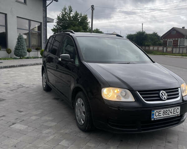 Черный Фольксваген Туран, объемом двигателя 1.9 л и пробегом 284 тыс. км за 6500 $, фото 2 на Automoto.ua