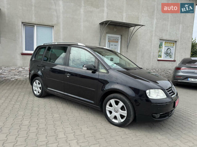 Черный Фольксваген Туран, объемом двигателя 1.98 л и пробегом 188 тыс. км за 4600 $, фото 2 на Automoto.ua