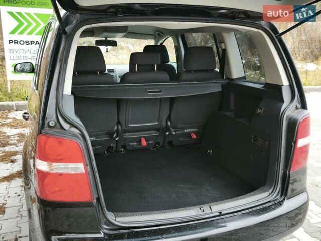 Черный Фольксваген Туран, объемом двигателя 2 л и пробегом 321 тыс. км за 5500 $, фото 35 на Automoto.ua