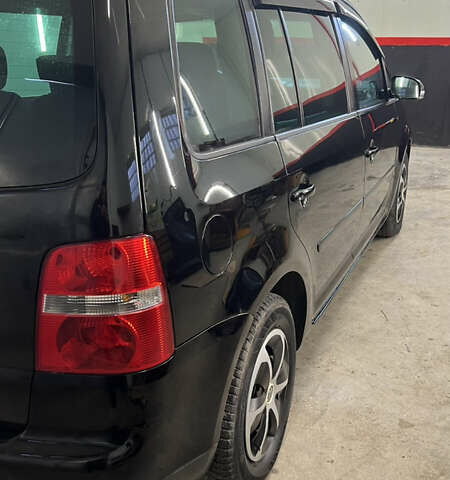 Черный Фольксваген Туран, объемом двигателя 1.9 л и пробегом 419 тыс. км за 5900 $, фото 9 на Automoto.ua